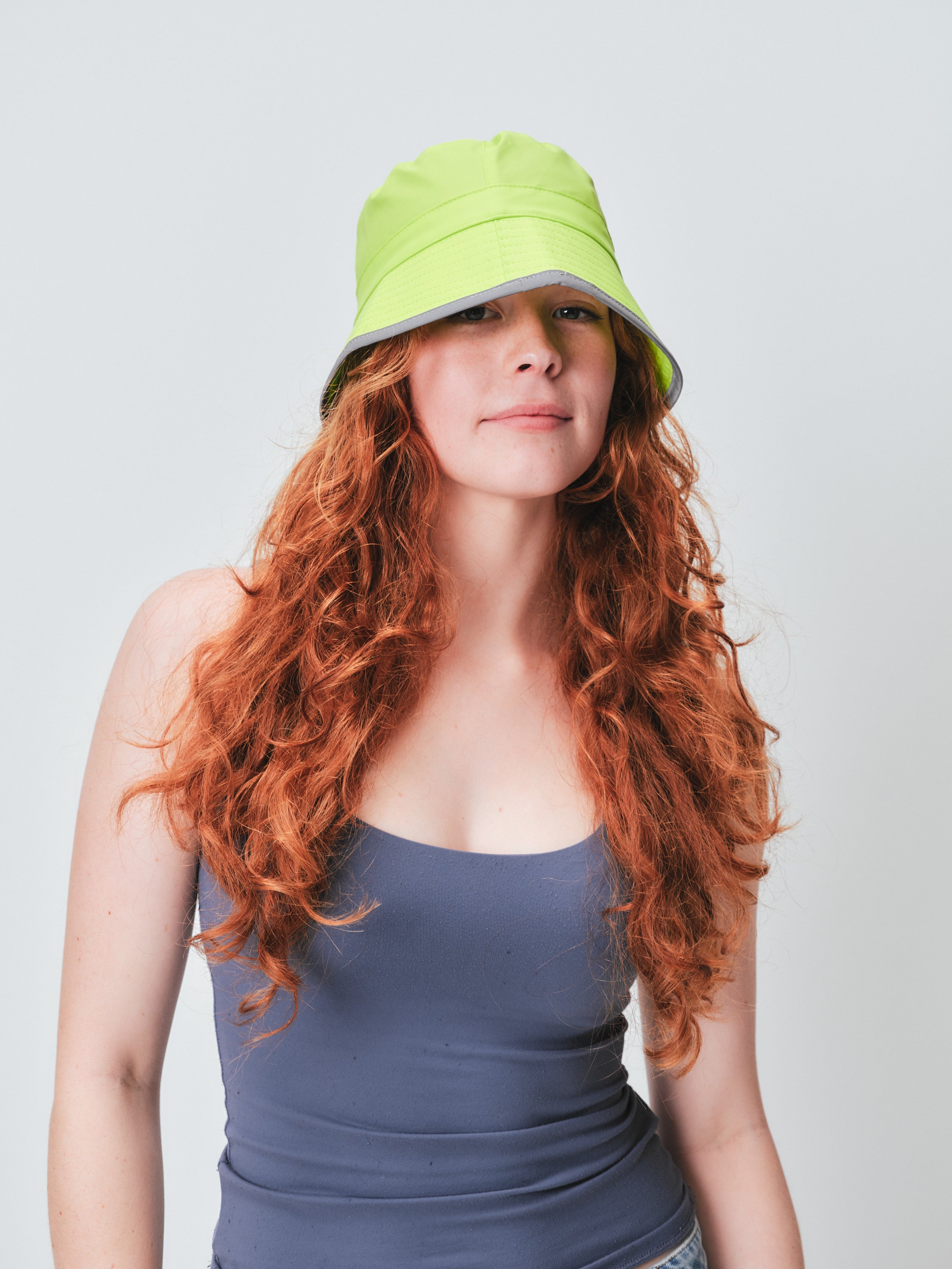 RAINS reflective lime bucket hat