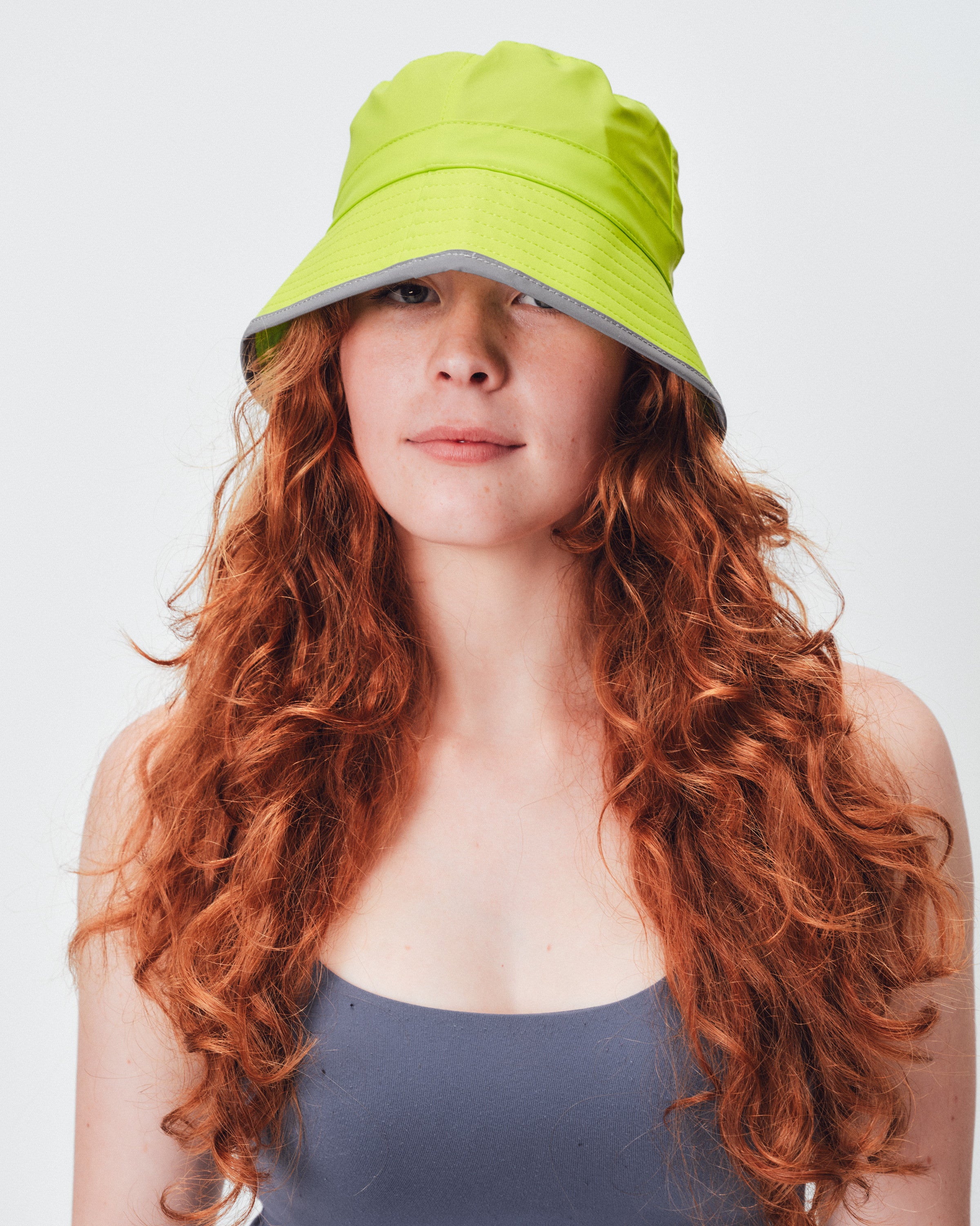 RAINS reflective lime bucket hat