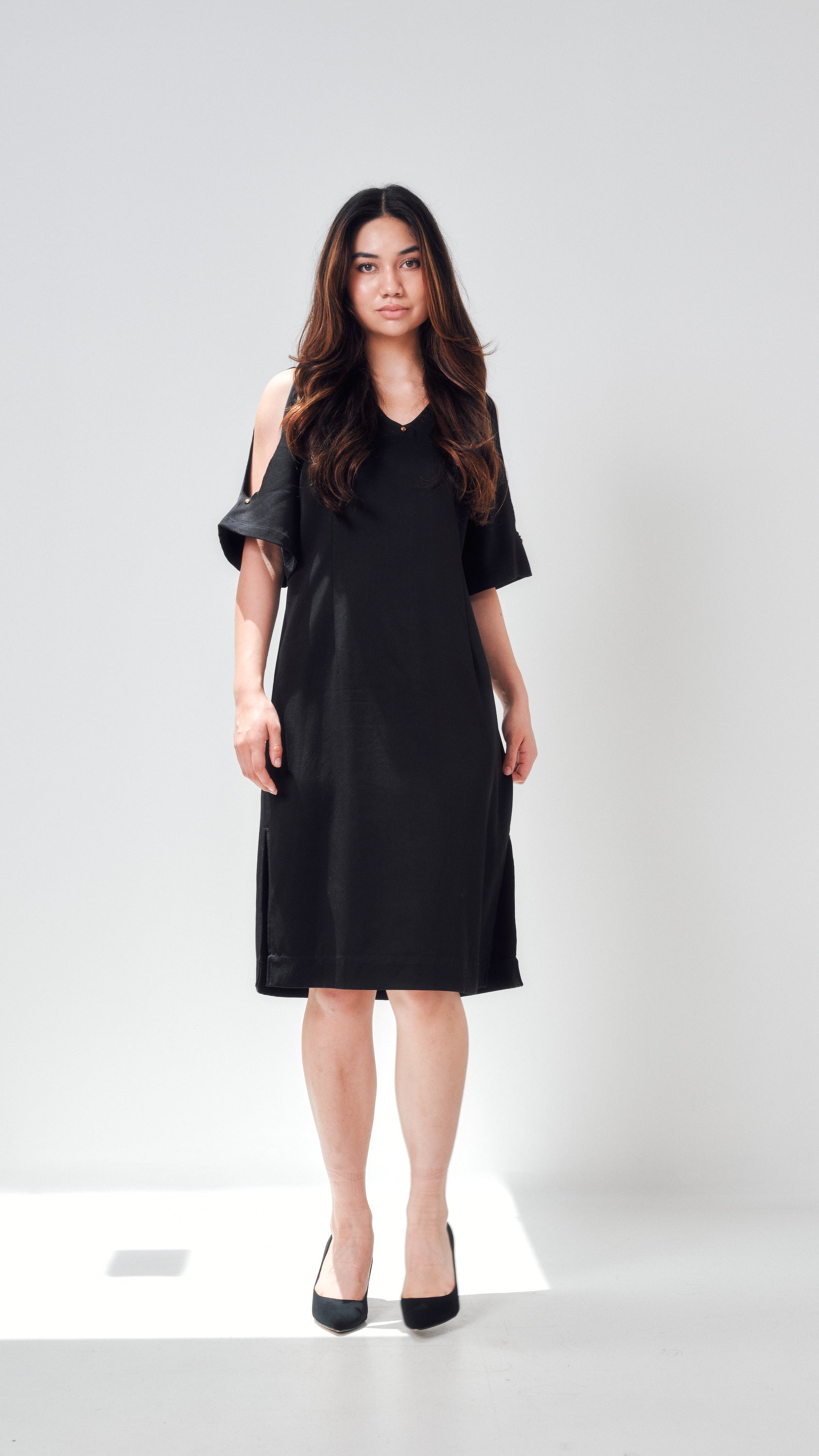 Andrea Moore cut out shoulder dress